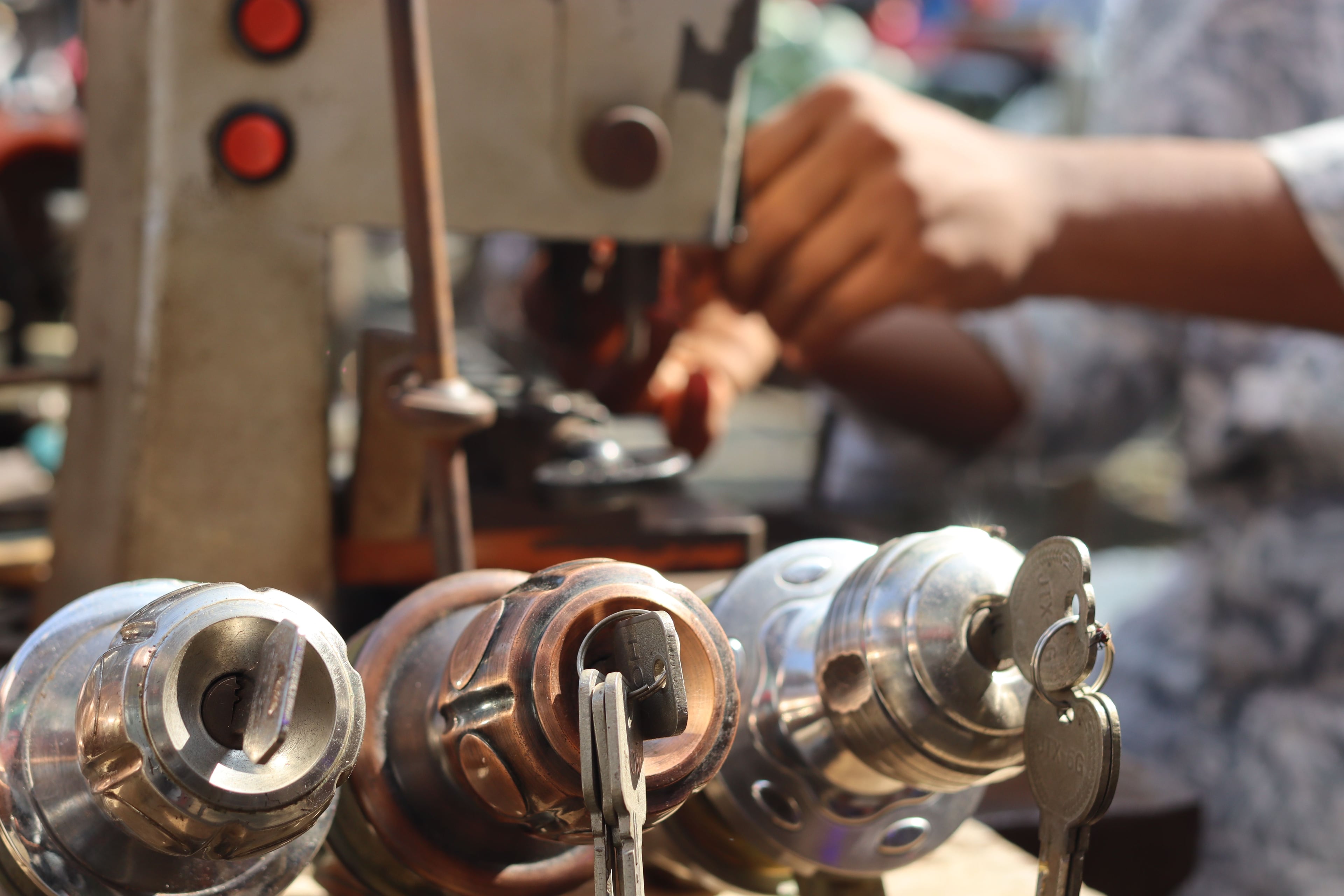 Professional licensed locksmith working precisely with lock hardware and keys
